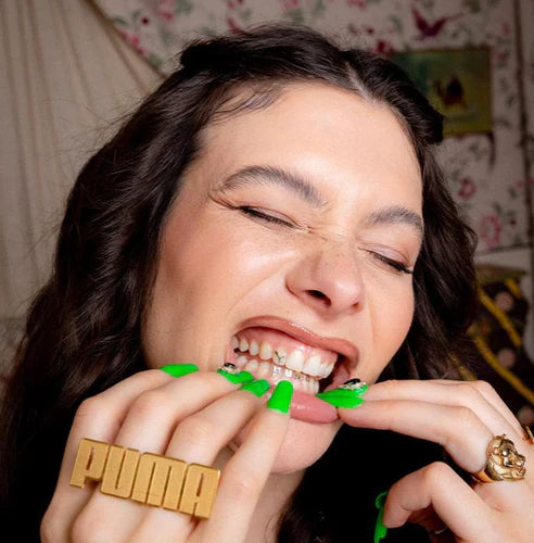 Puma tooth gems, brand teeth gems, teeth jewelry custom