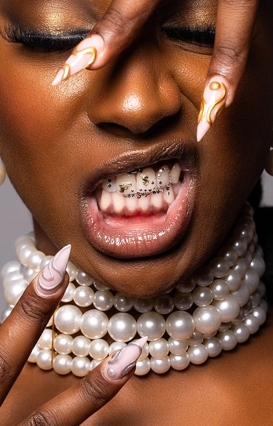 gold teeth jewelry and swarovski tooth gems