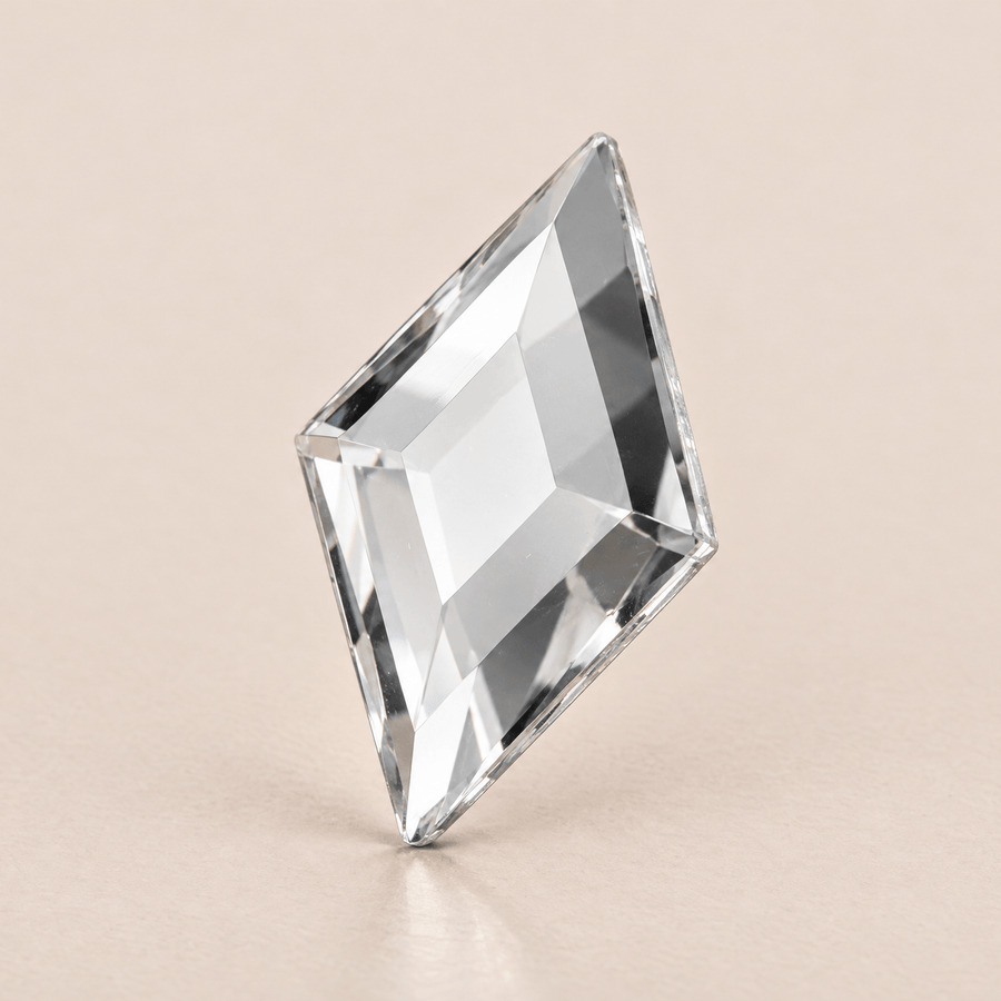 Swarovski Diamond Shape Crystal Tooth gems — shown greatly enlarged