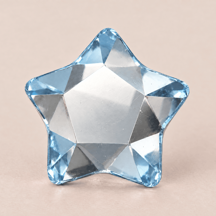 Swarovski Star Aquamarine Tooth gems — shown greatly enlarged