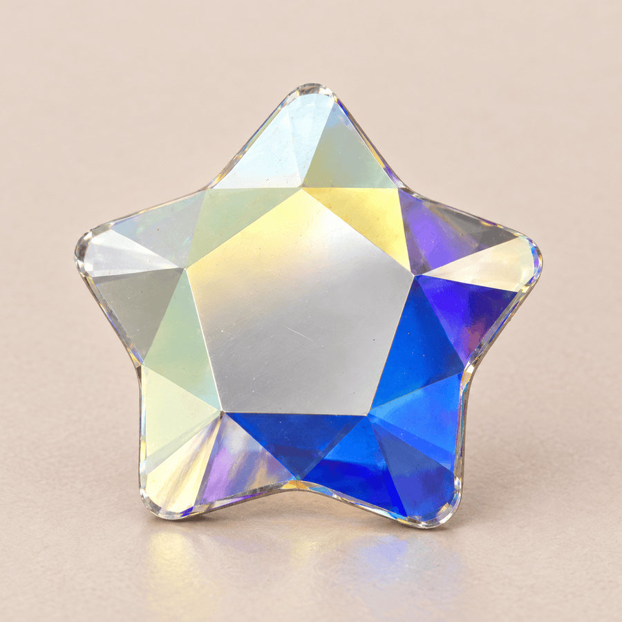 Swarovski Star Crystal AB Tooth gems — shown greatly enlarged