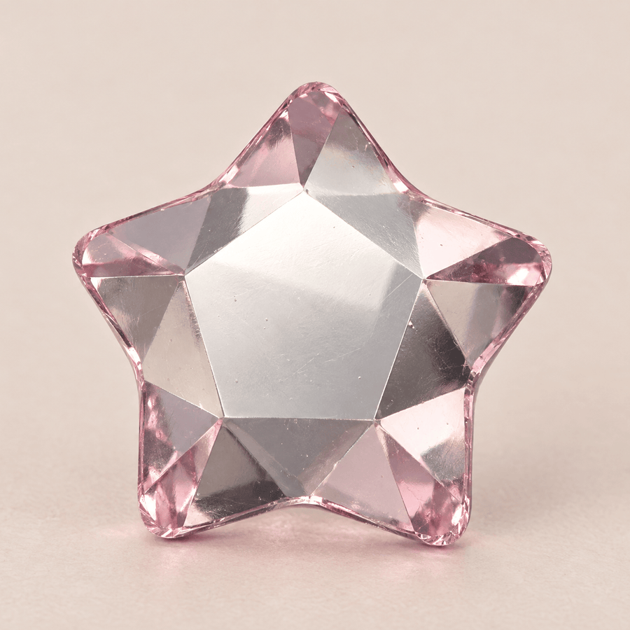 Swarovski Star Light Rose Tooth gems — shown greatly enlarged
