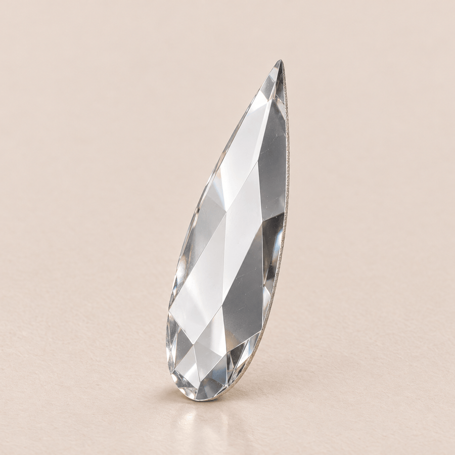 Swarovski Raindrop Crystal Tooth gems — shown greatly enlarged