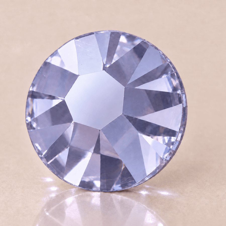 Swarovski Provence Lavender tooth gems — sterk vergroot