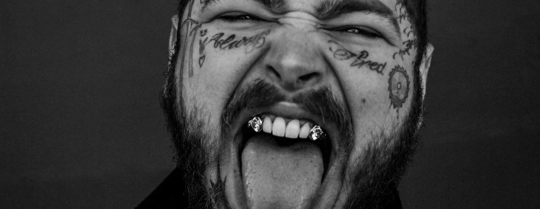 Tooth gems post malone wearing gold grillz