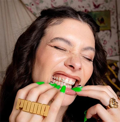 tooth gems puma, teeth jewery Isisngold's Puma collaboration