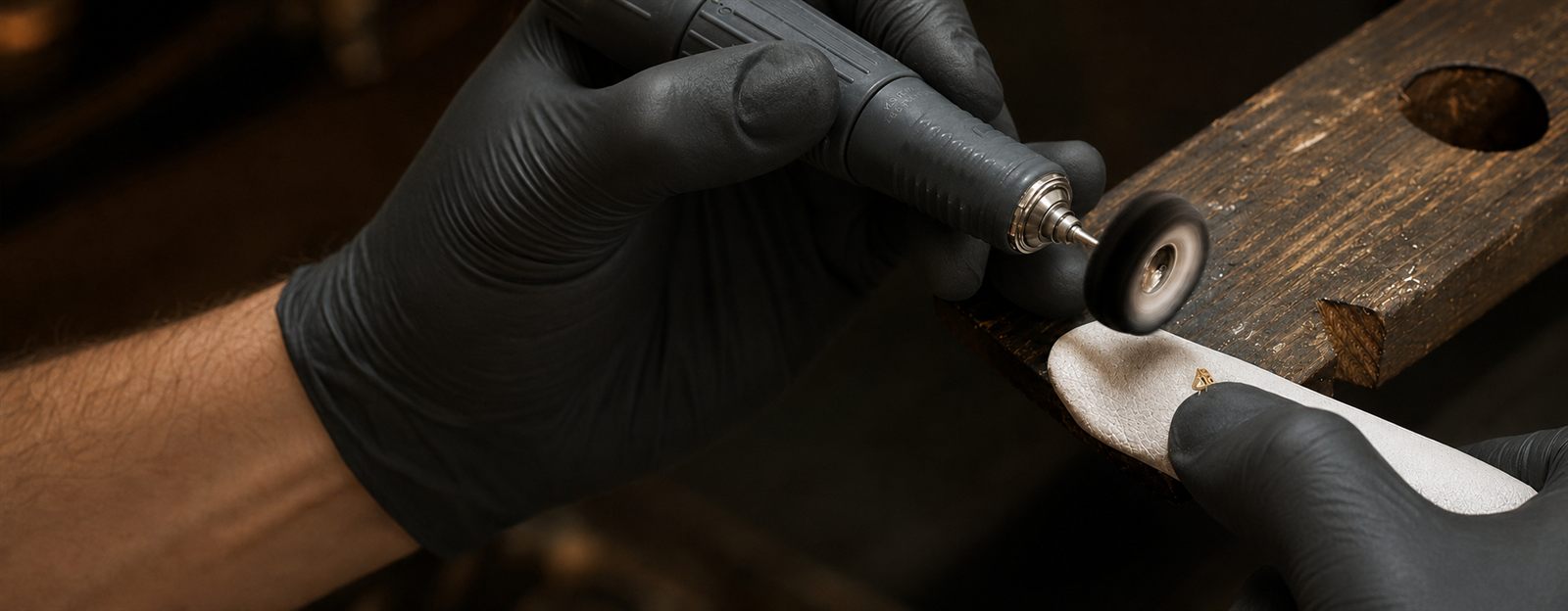 Hand-finishing a solid 18K gold tooth jewel in our French workshop